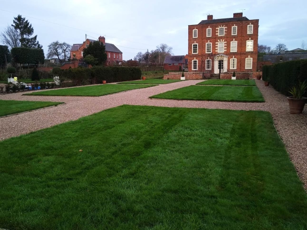 This image is shows the same lawn in the weeks following it benefitting from our lawn care services. The grass is very healthy and thick