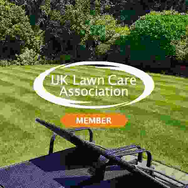 This image is of the UK Lawn Care Association logo with the backdrop of a lawn which receives lawn treatment services